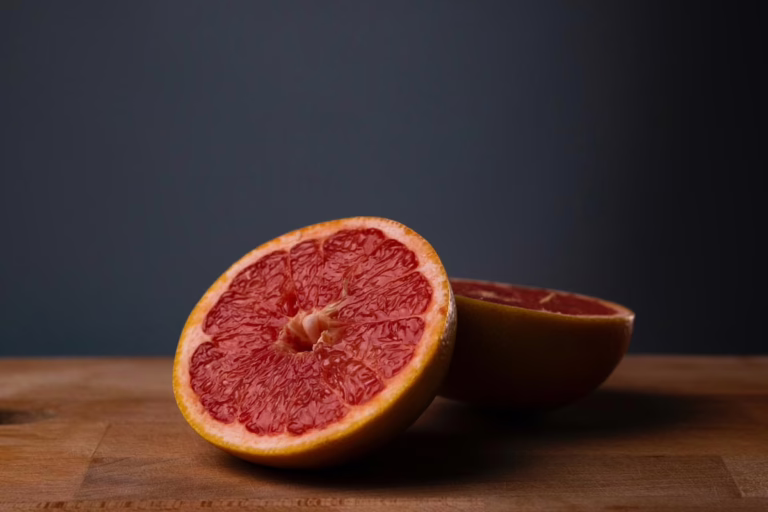 Citrus grapefruit 'Star Ruby' (Grapefruit) open fruit.